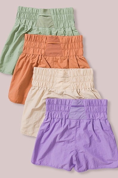 Butter Orange Smocked Windbreaker Shorts